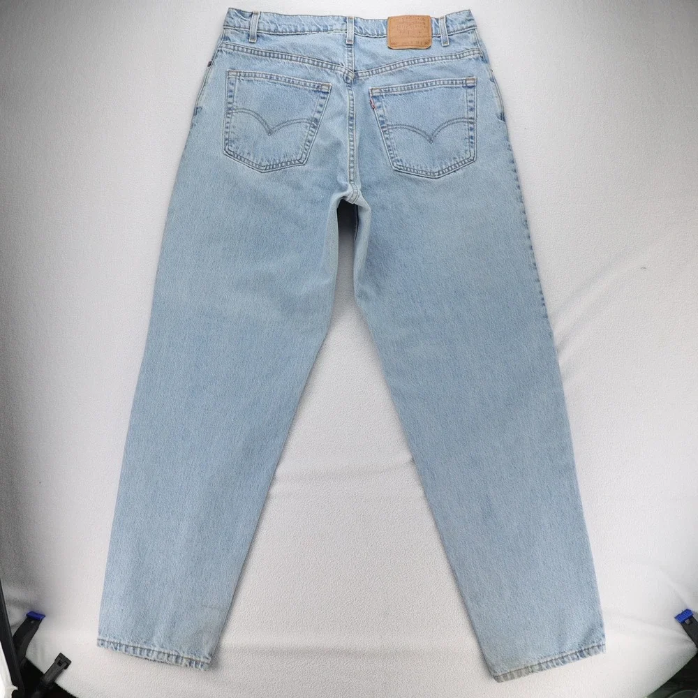 Levis 560 Comfort Fit Tapered Leg Jeans Mens 38x34 Light Wash Blue Vintage USA‎